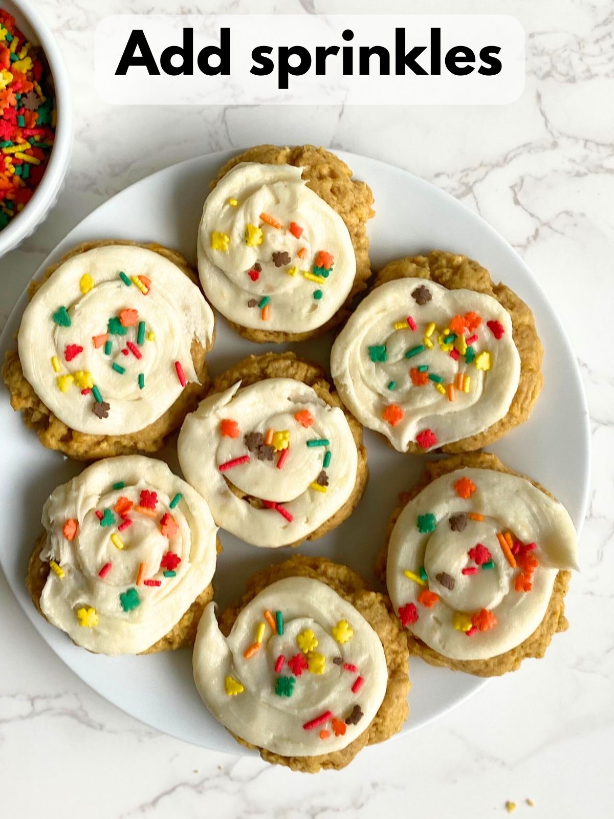 fall frosted sugar cookies decorated with sprinkles