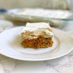 pumpkin poke cake with brown butter maple frosting