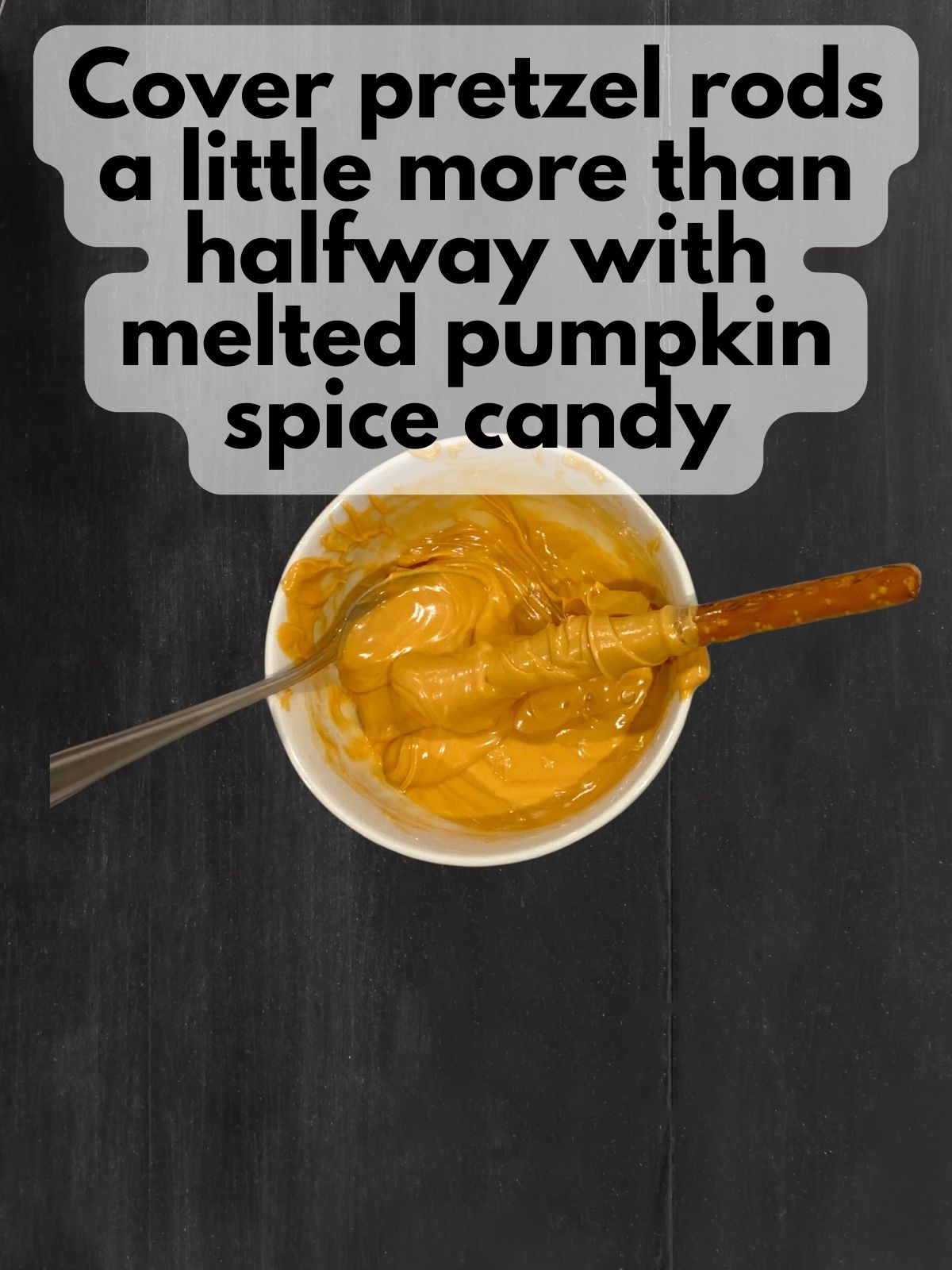 preztel rods dipped in melted pumpkin spice candy melts