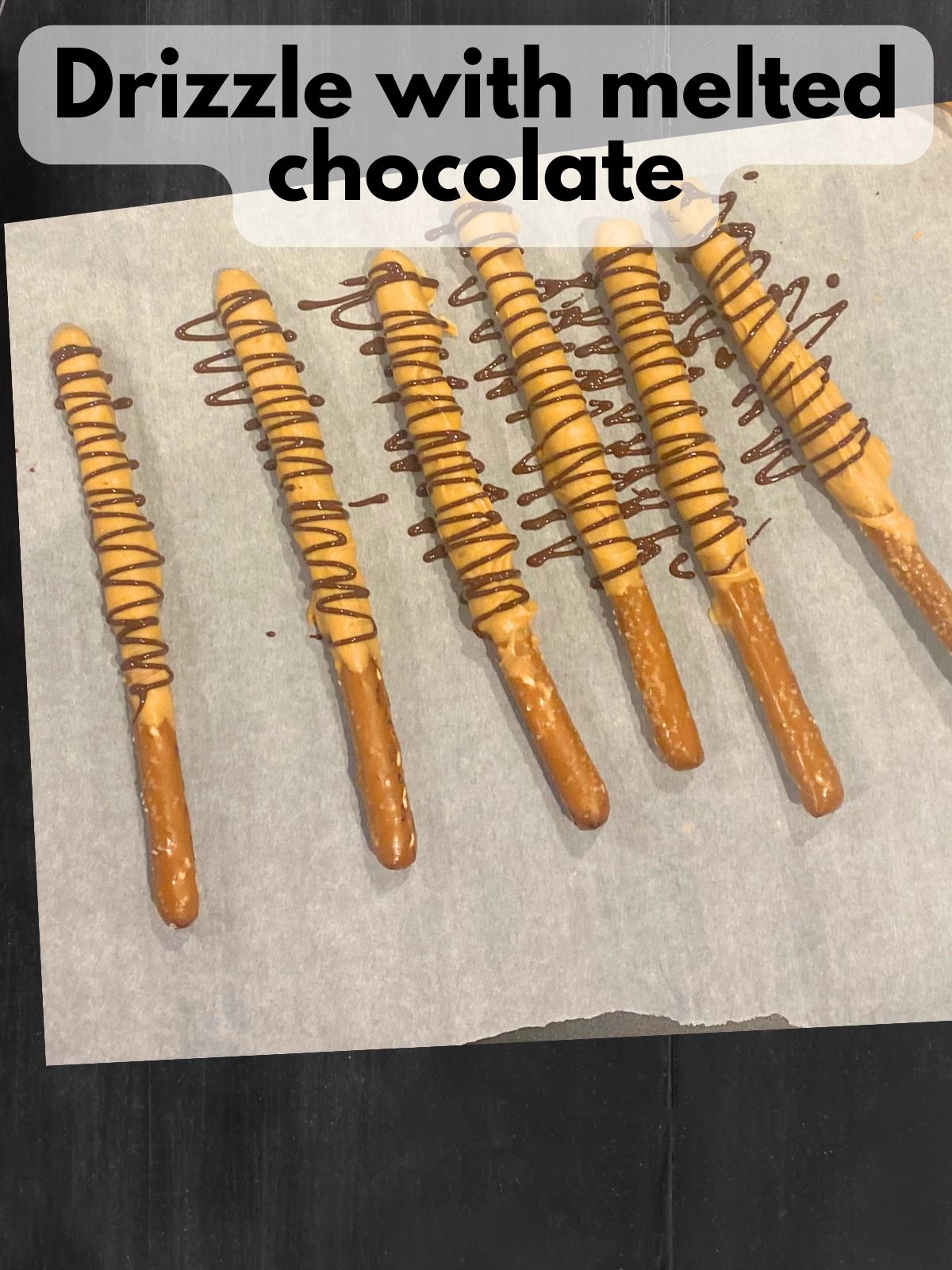 pretzel rods coated in pumpkin pie spice with a drizzle