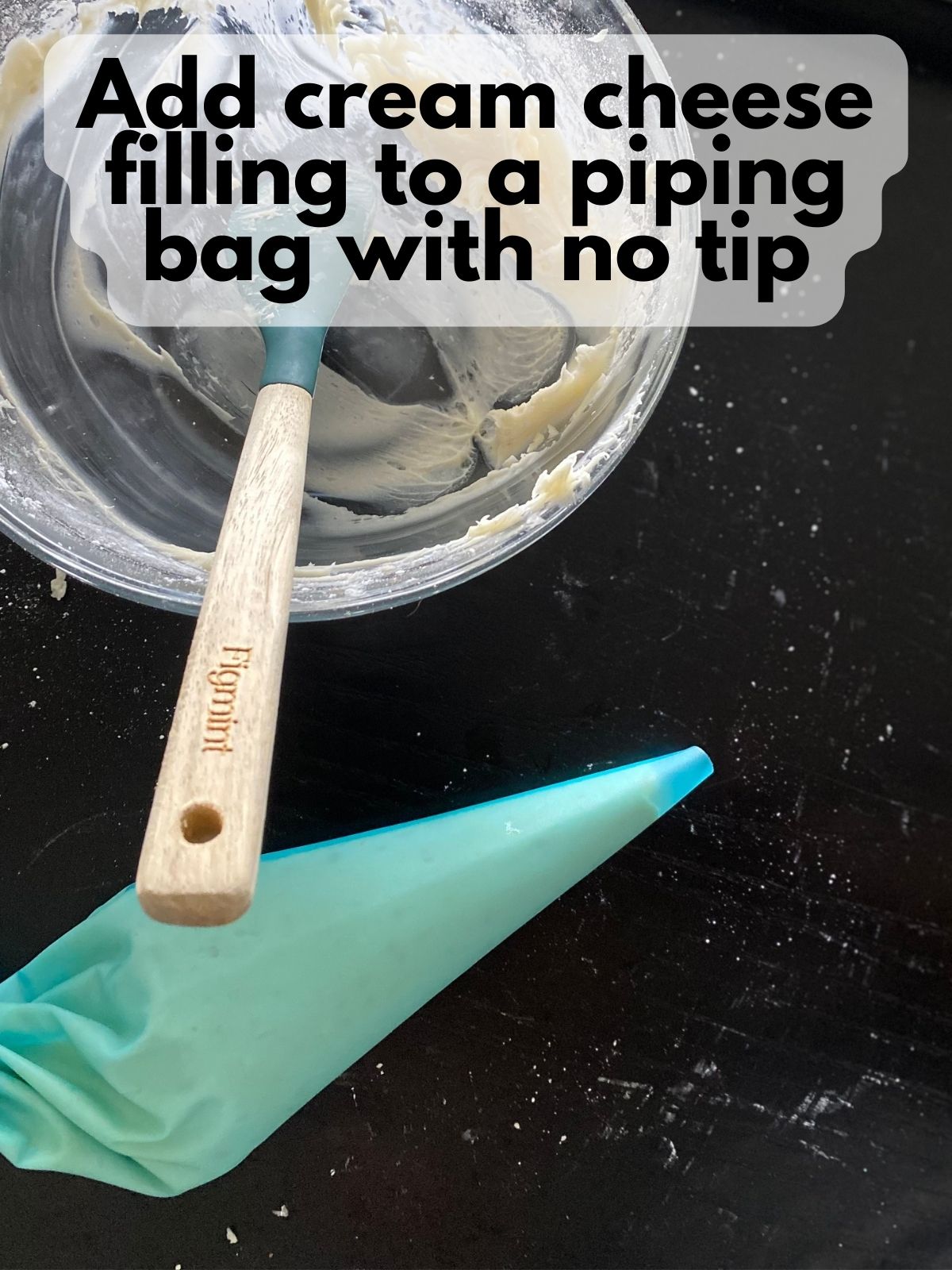 cream cheese frosting in a piping bag with no tip