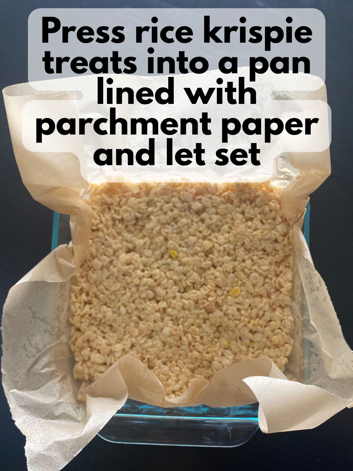 rice krispie treats pressed into a pan