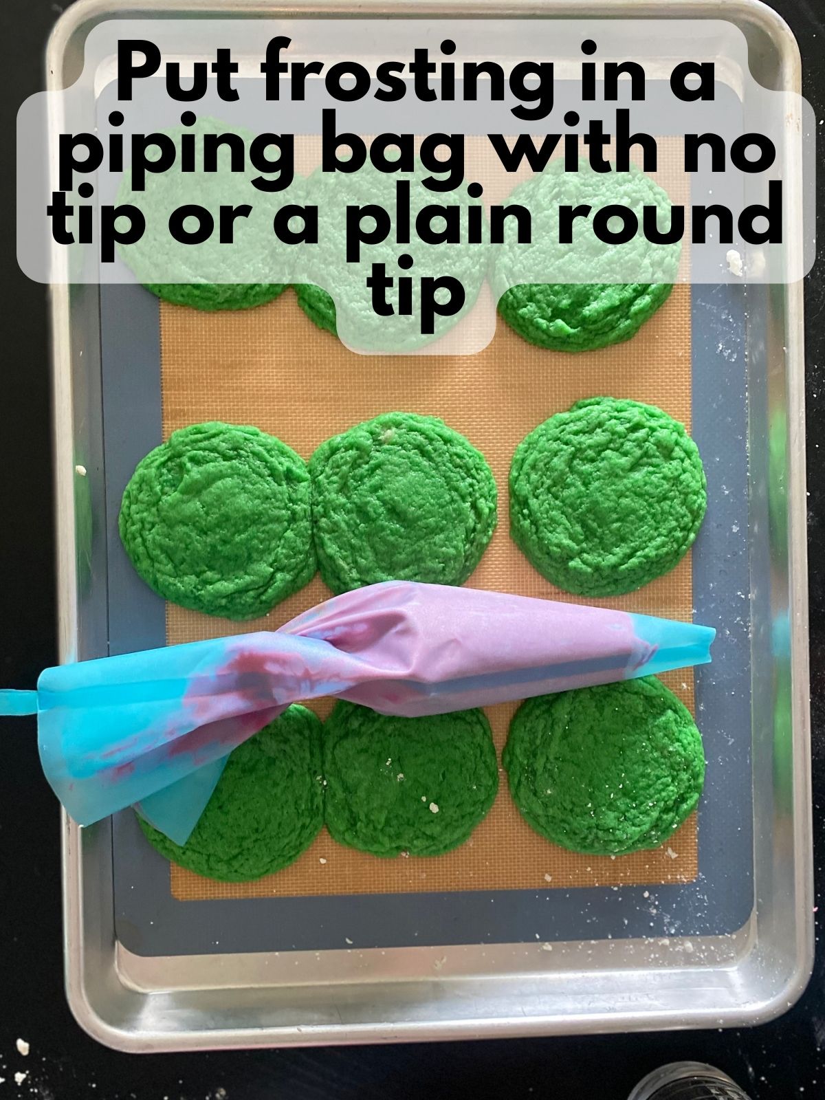 pink buttercream frosting in a piping bag