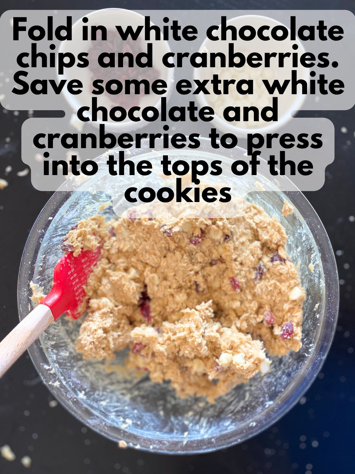 cranberries and white chocolate chips folded into cookie dough