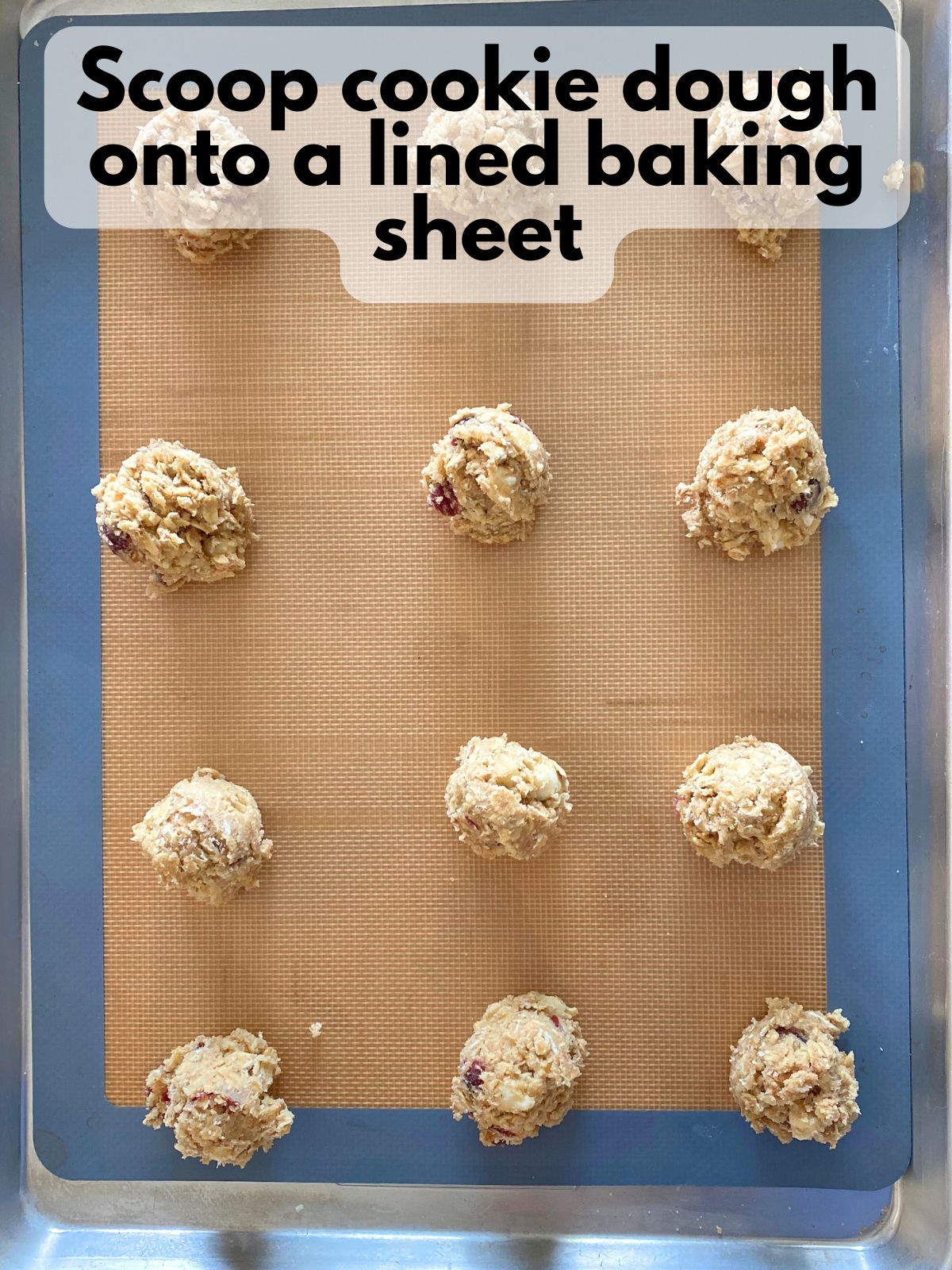 cookie dough scooped onto a baking sheet