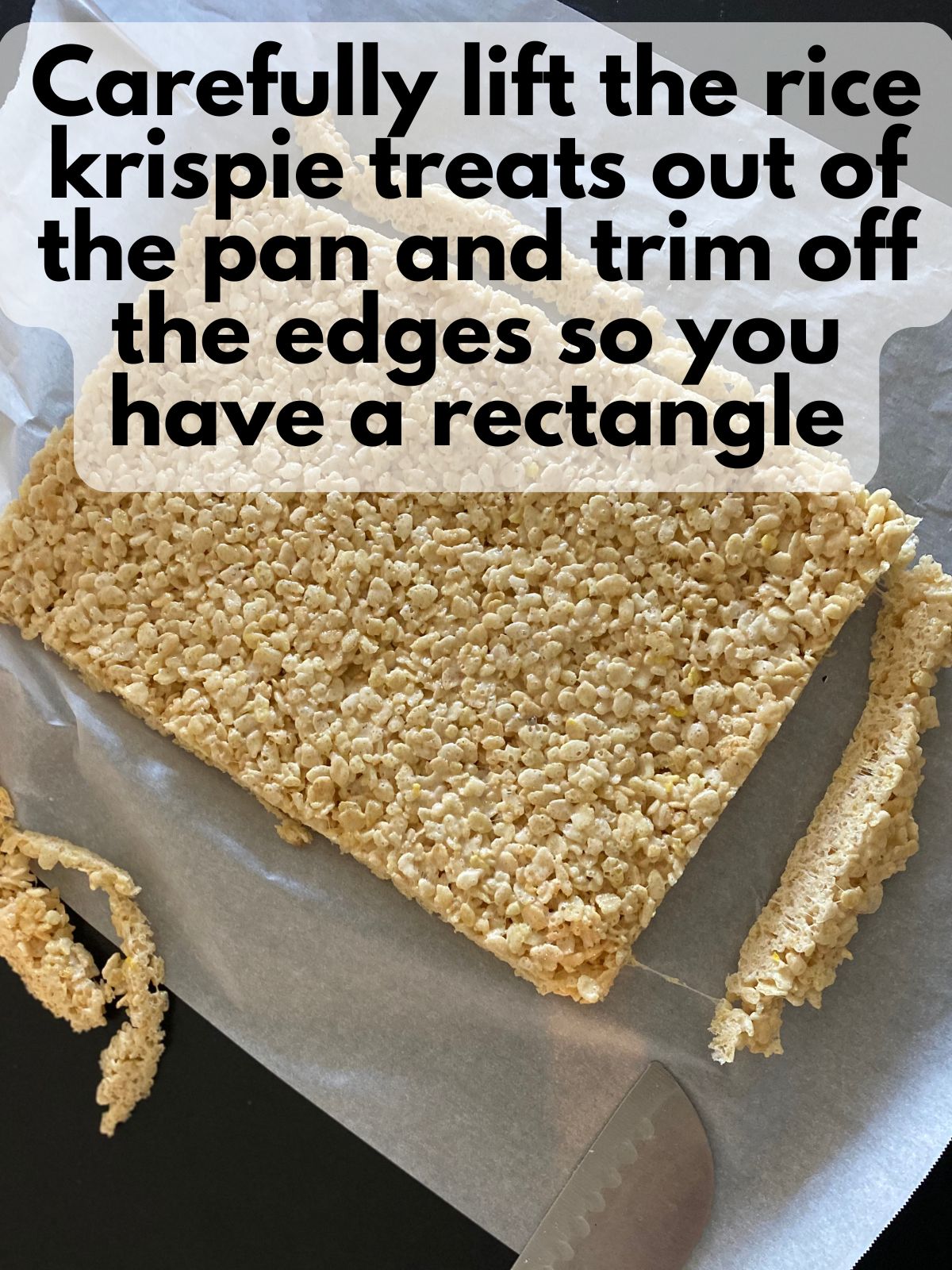 larbe pan of rice krispie treats with edges trimmed