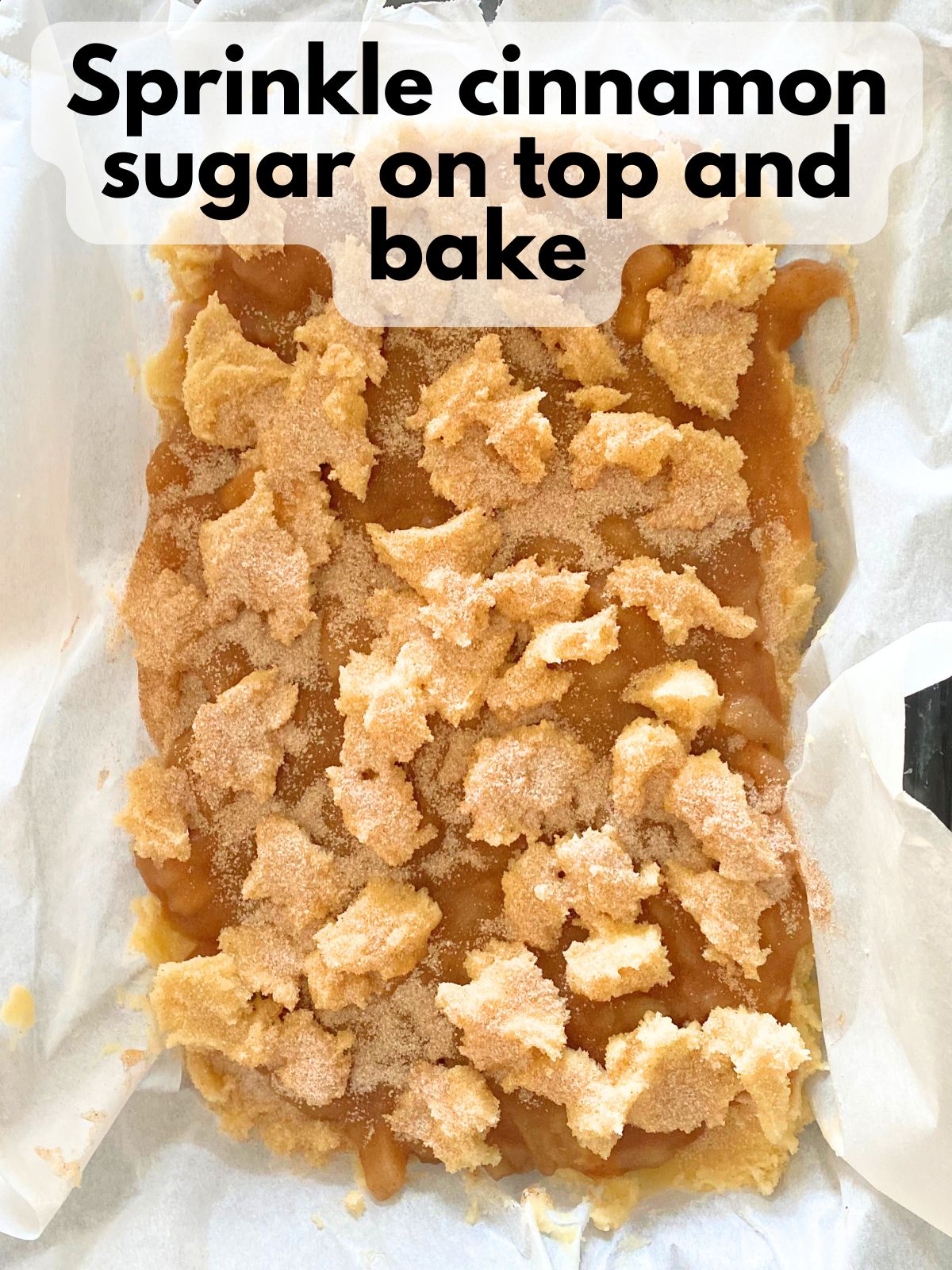 unbaked apple pie sugar cookie bars sprinkled with cinnamon sugar