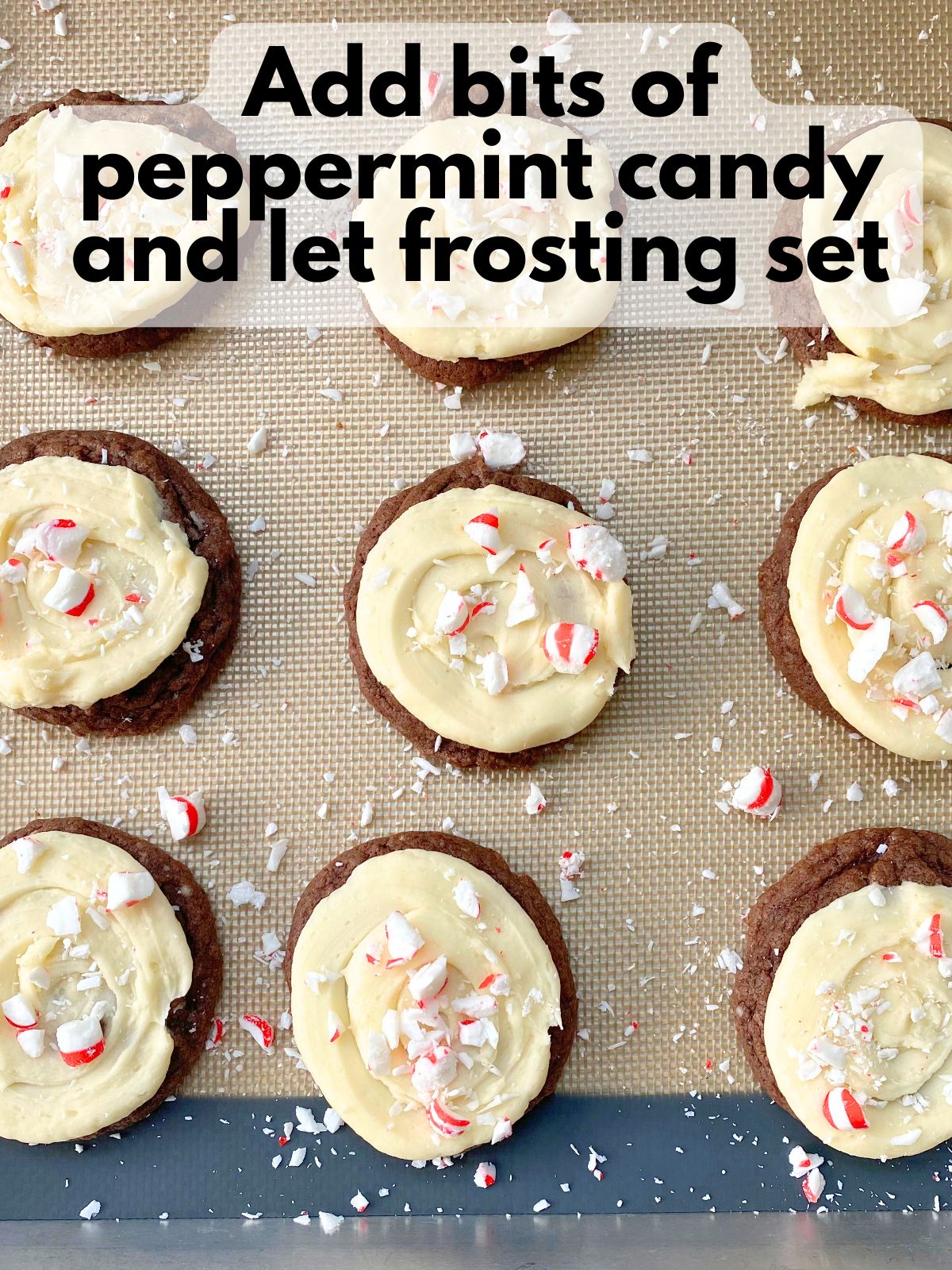 frosted chocolate cake mix cookies with peppermint candy on top