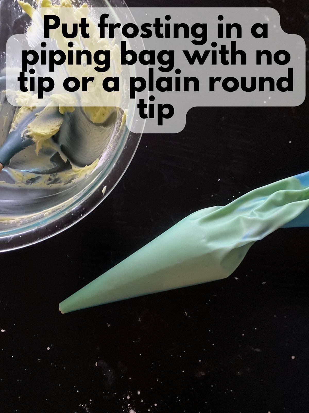 green buttercream frosting in a piping bag