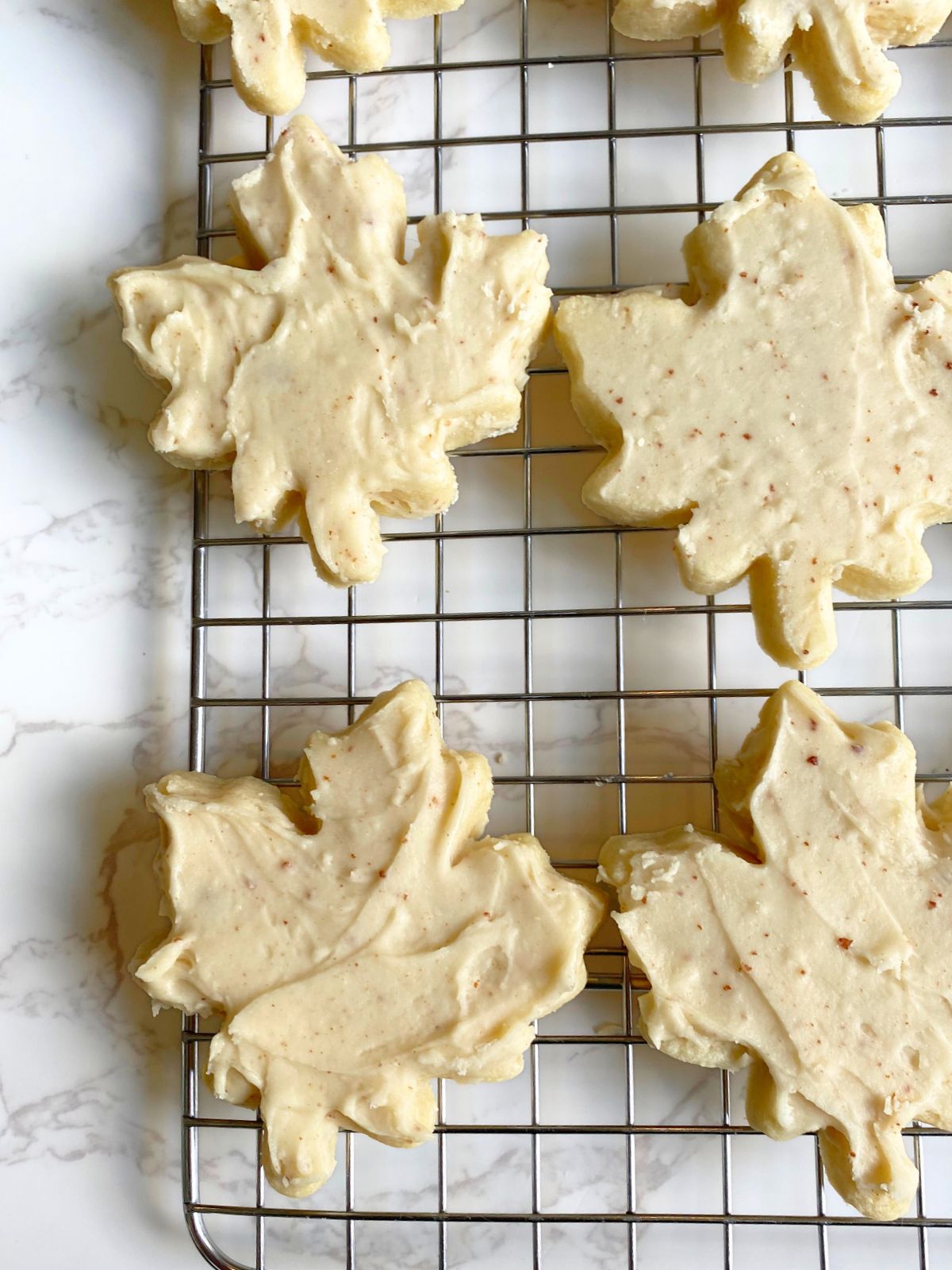 maple leaf cookies with brown butter maple glaze