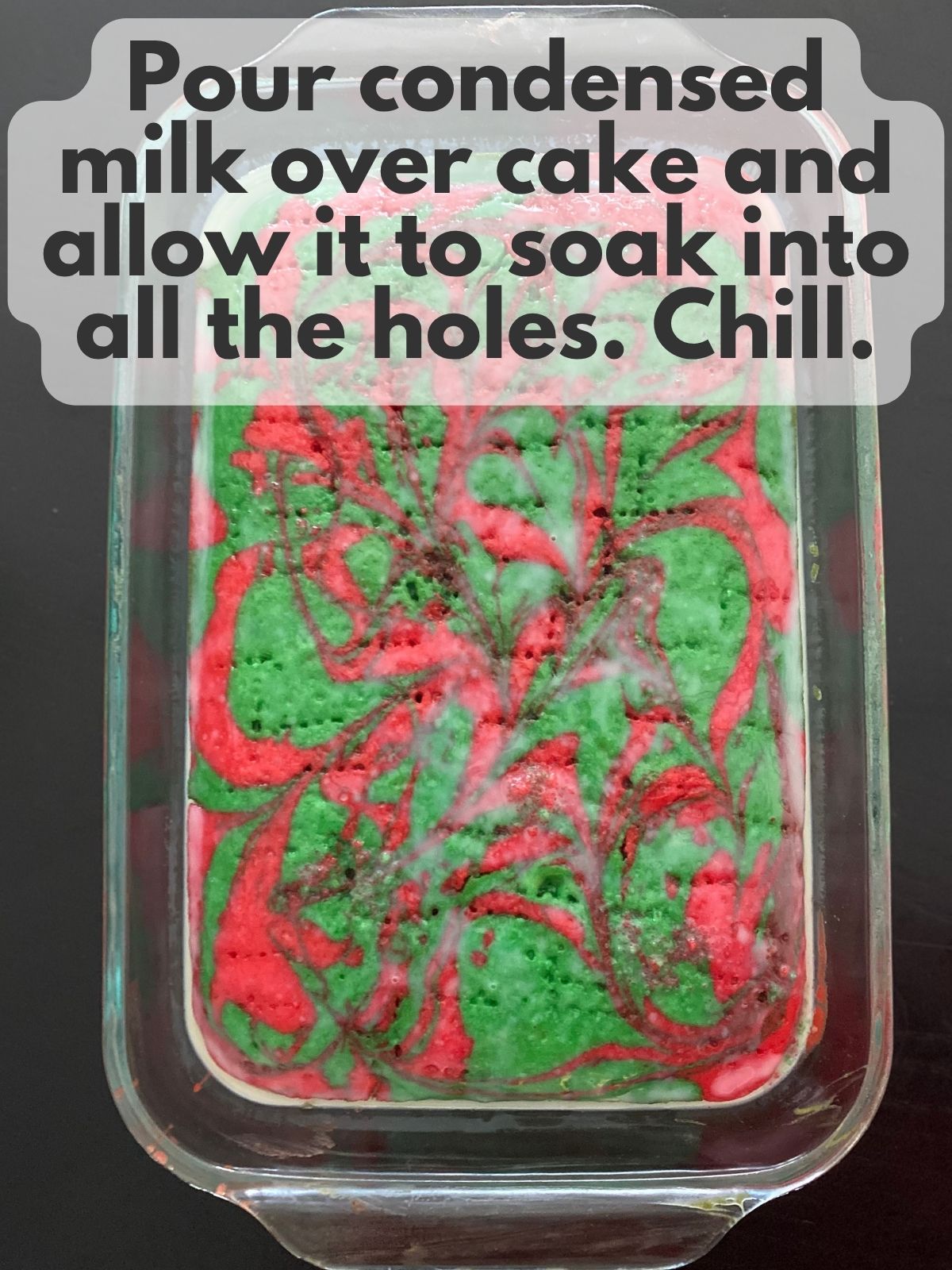 Christmas poke cake soaked with sweetened condensed milk