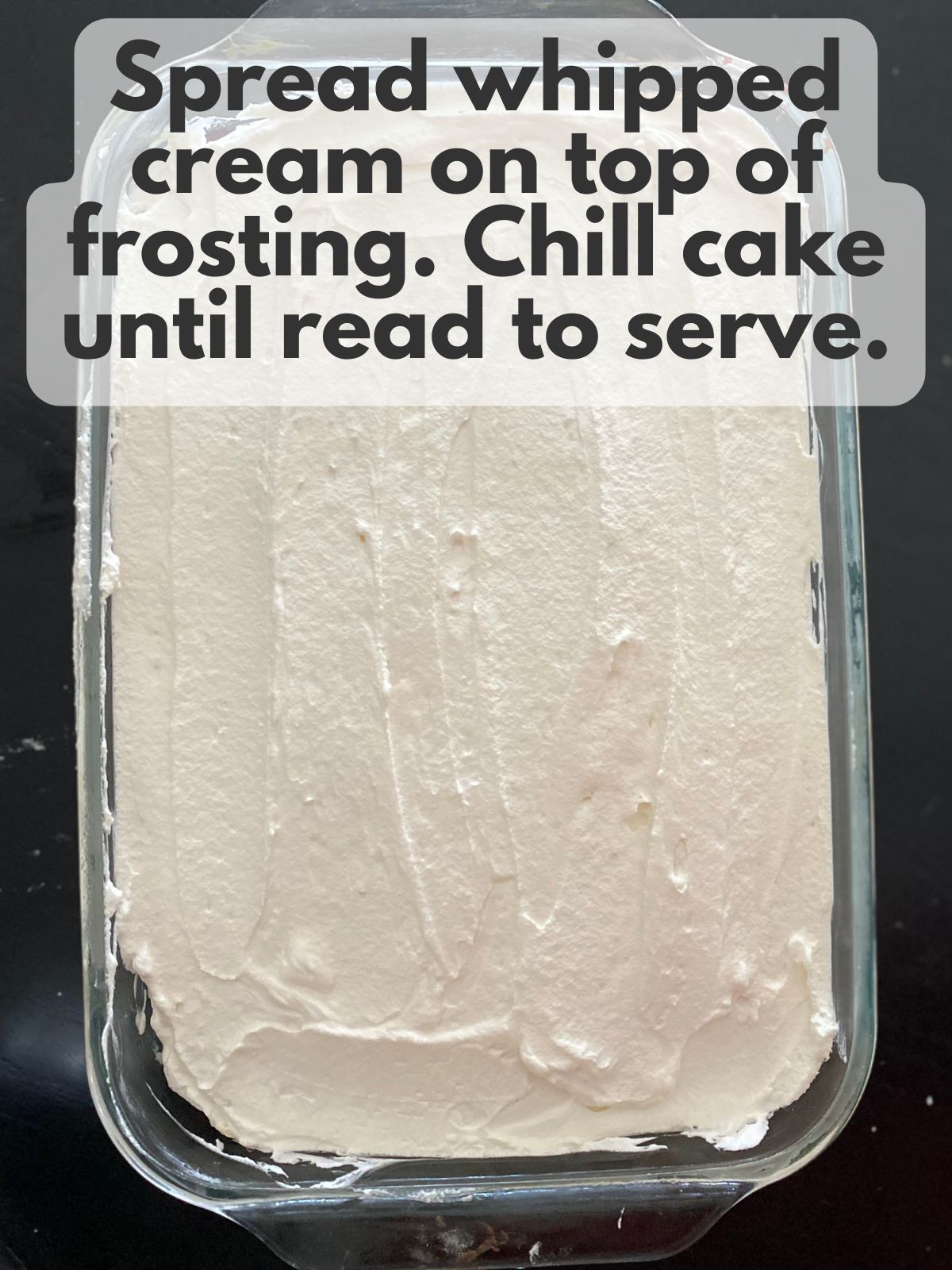 whipped cream spread on top of vanilla buttercream
