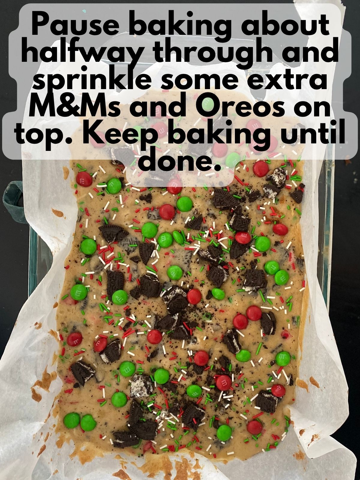 parbaked Christmas blondies with extra M&Ms, Oreos and sprinkles on top