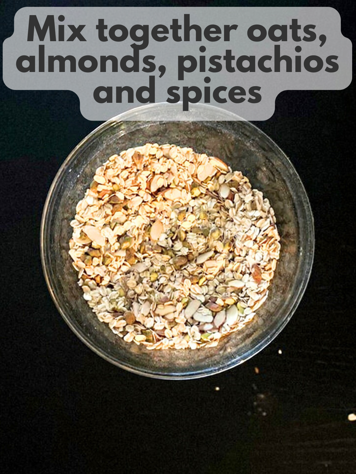 oats, almonds, chopped pistachios, cinnamon, nutmeg and salt mixed together