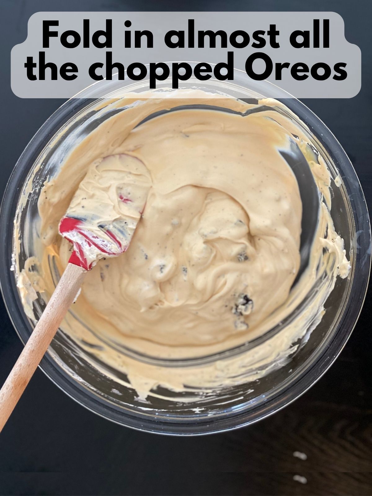 chopped oreos folded into dulce de leche ice cream