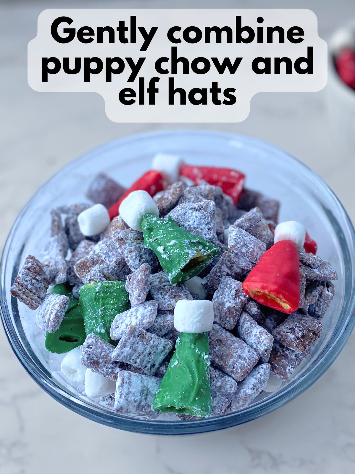 elf hat puppy chow in a bowl