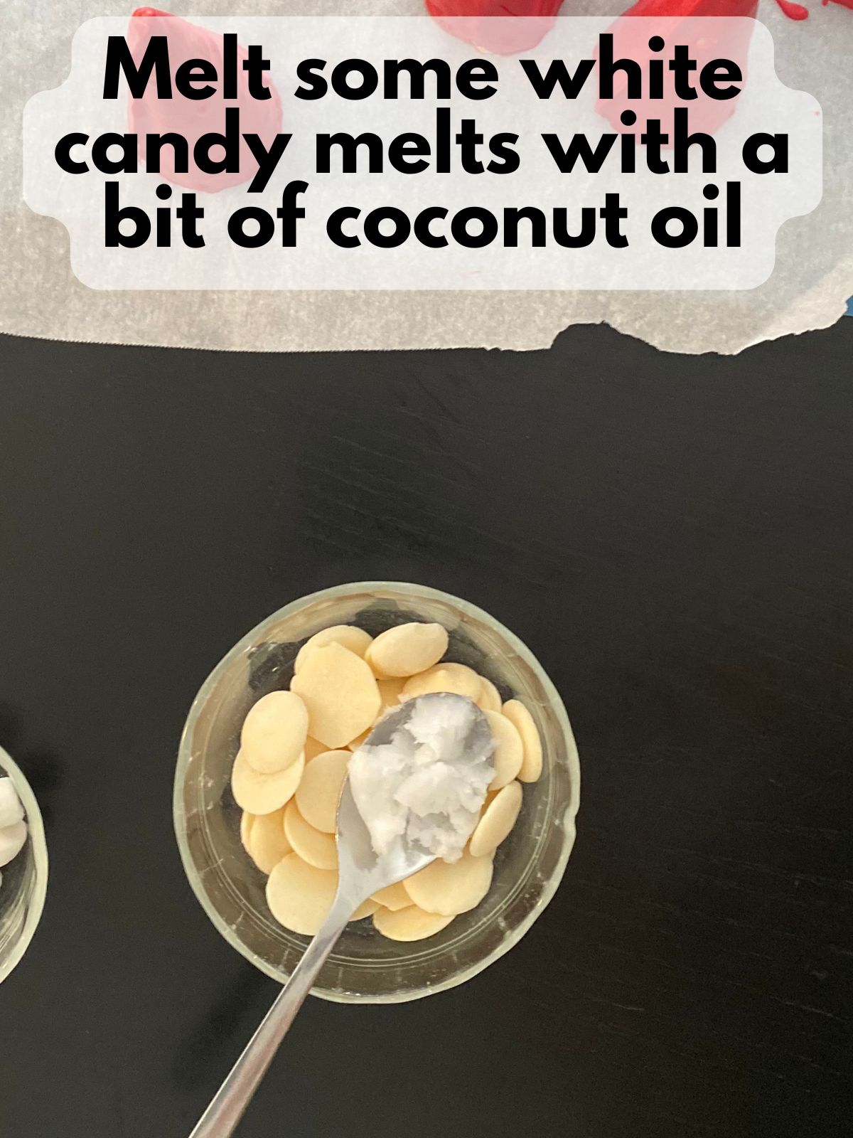 white chocolate candy melts in a bowl with some coconut oil