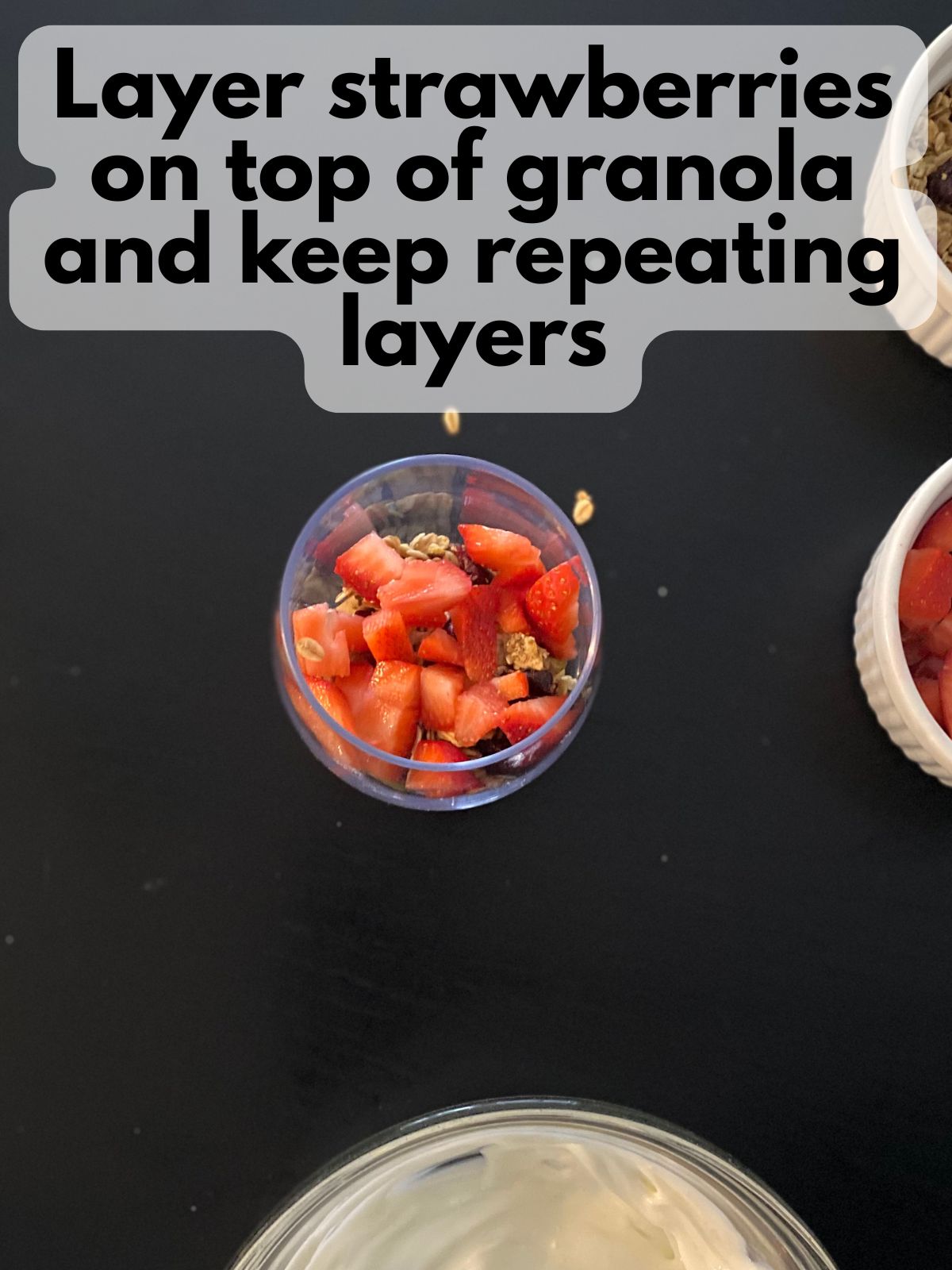 strawberries layered on top of parfait
