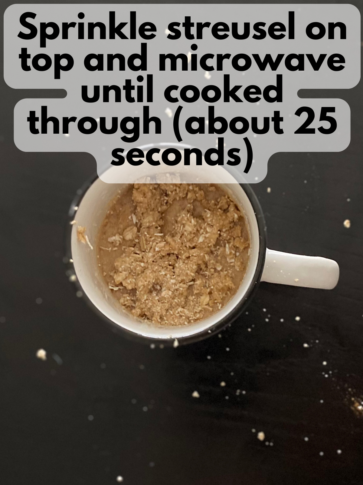 streusel sprinkled on top of par-baked mug cake