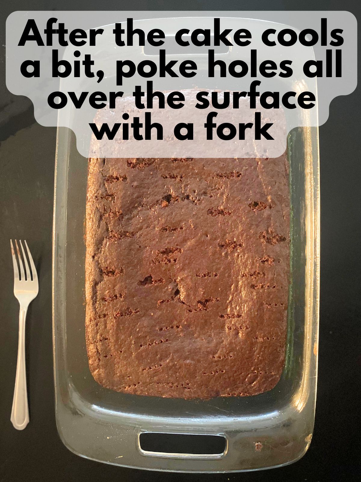 chocolate cake with holes poked in it