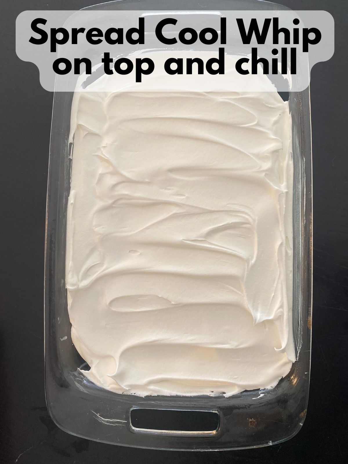 cool whip spread on top of poke cake