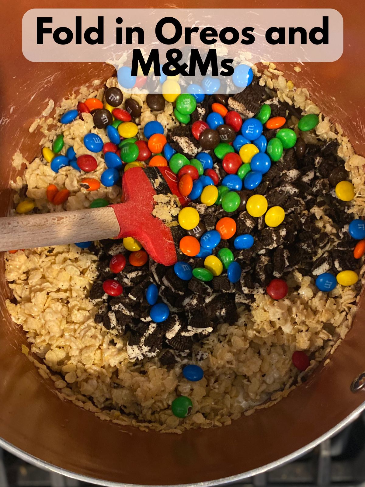 Oreos and M&M mixed into rice krispies and melted marshmallows