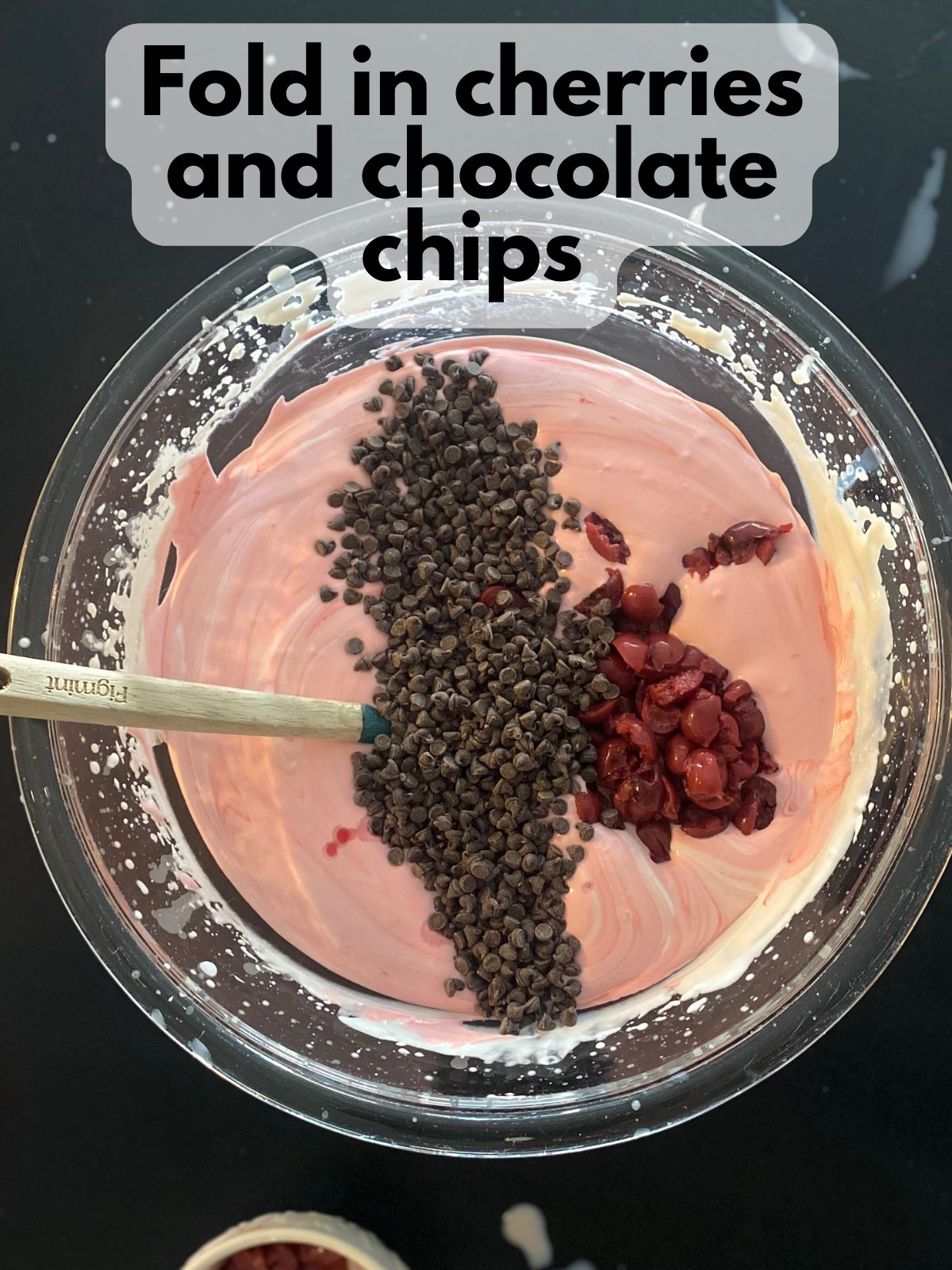 chocolate chips and cherries with cherry ice cream base