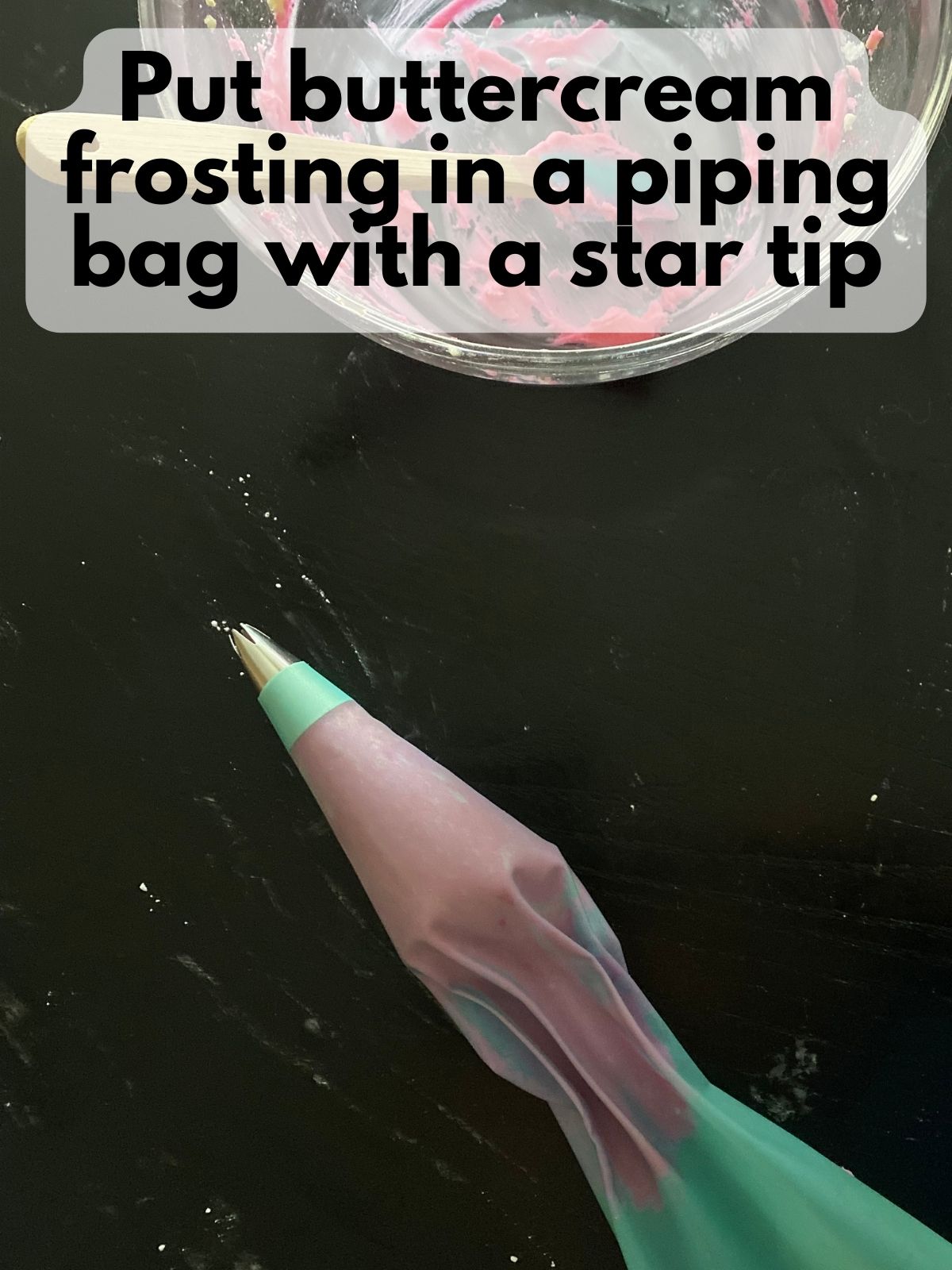 buttercream frosting in a piping bag with a star rip