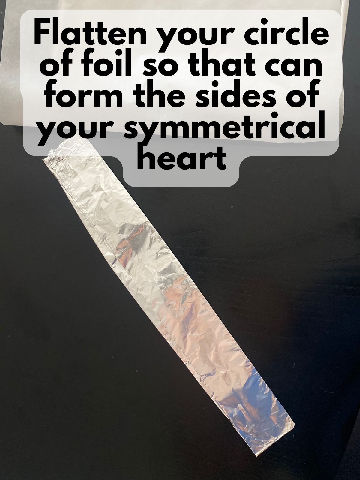 aluminum foil frame folded into 2 equal parts