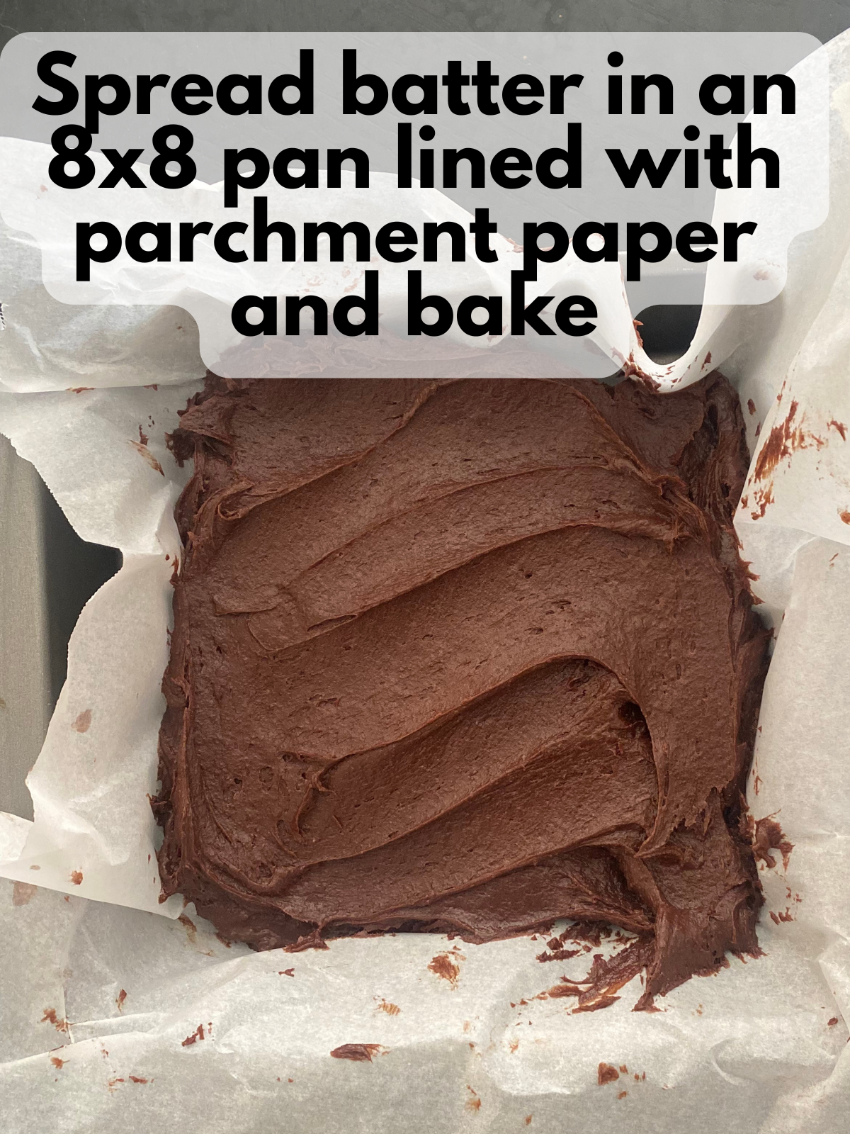 brownie batter spread in pan