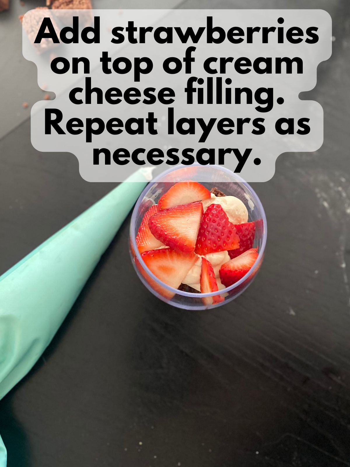 strawberries added on top of cream cheese filling