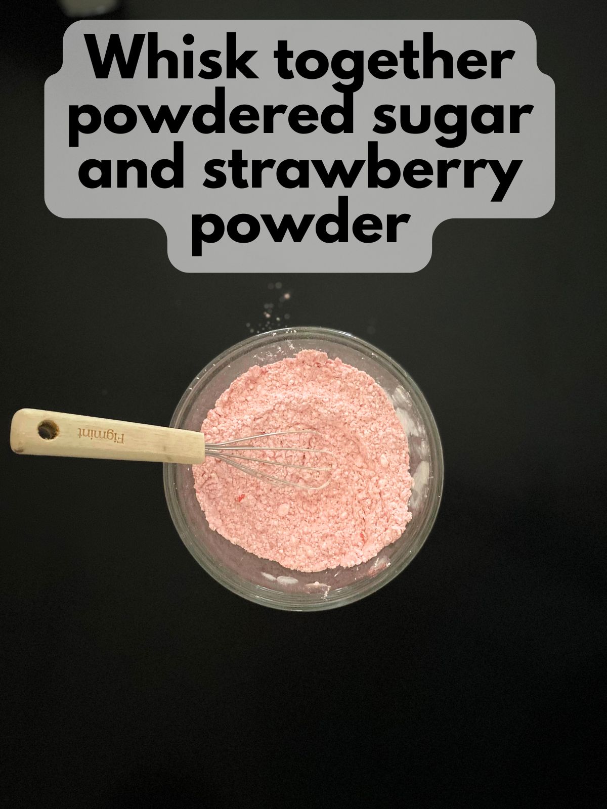 powdered sugar mixed with crushed freeze dried strawberries