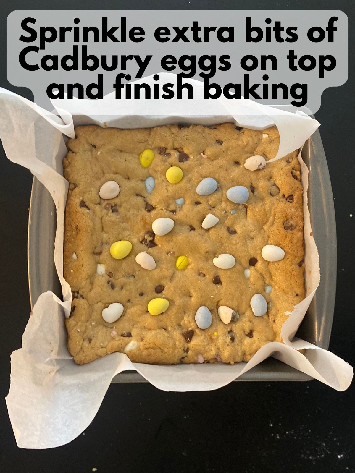 extra Cadbury egg bits sprinkled on parbaked cookie bars
