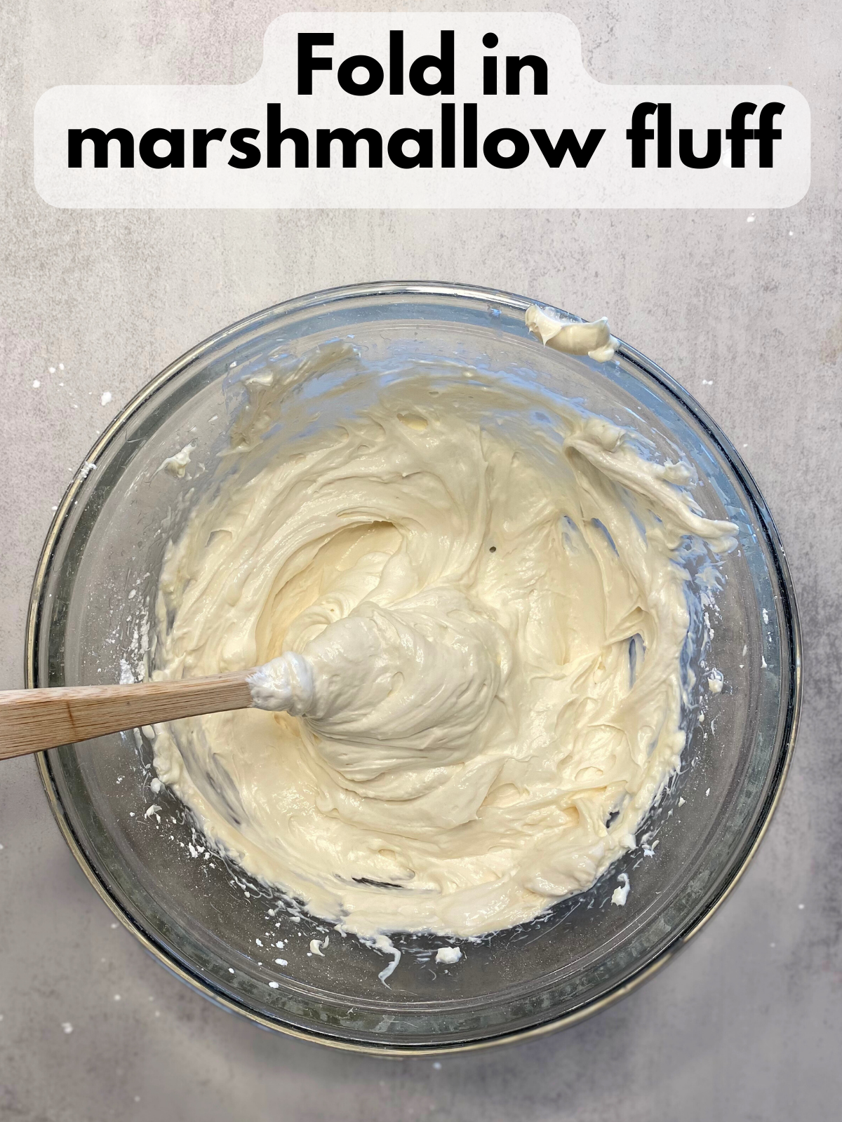 marshmallow fluff folded in to cream cheese, powdered sugar and vanilla