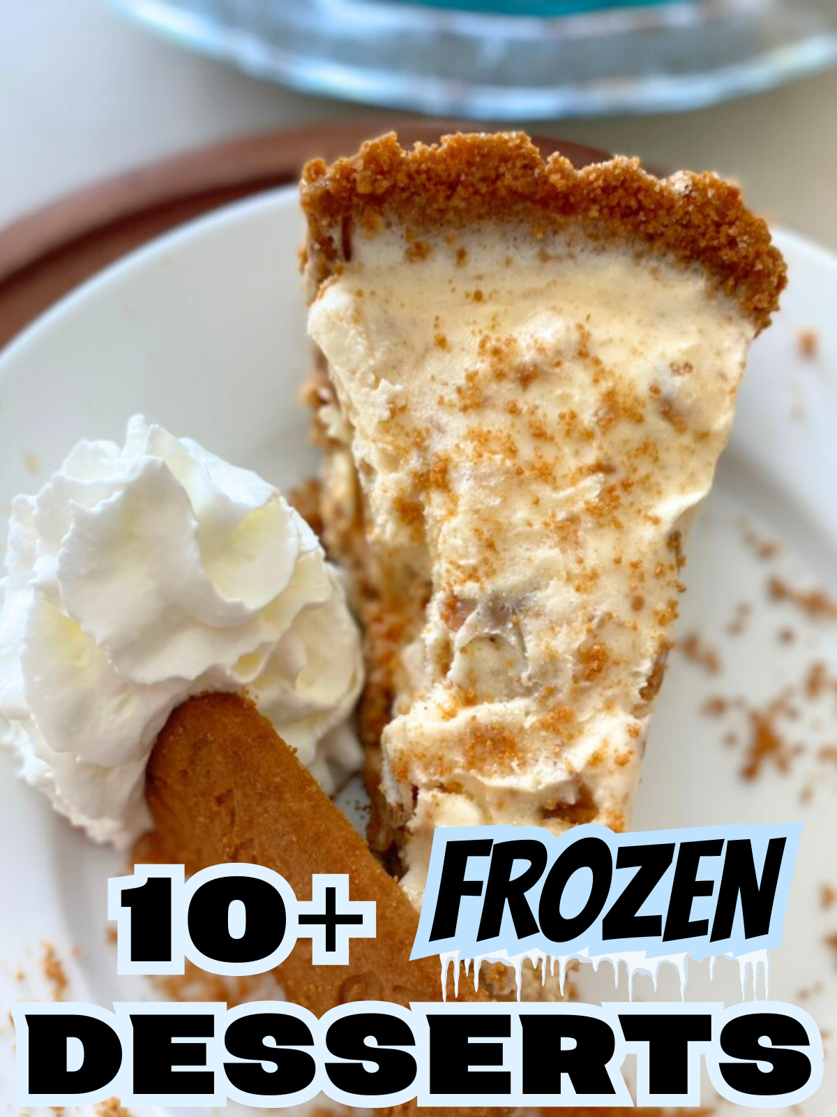 cookie butter ice cream pie on a plate next to a speculoos cookie and a dollop of whippe cream