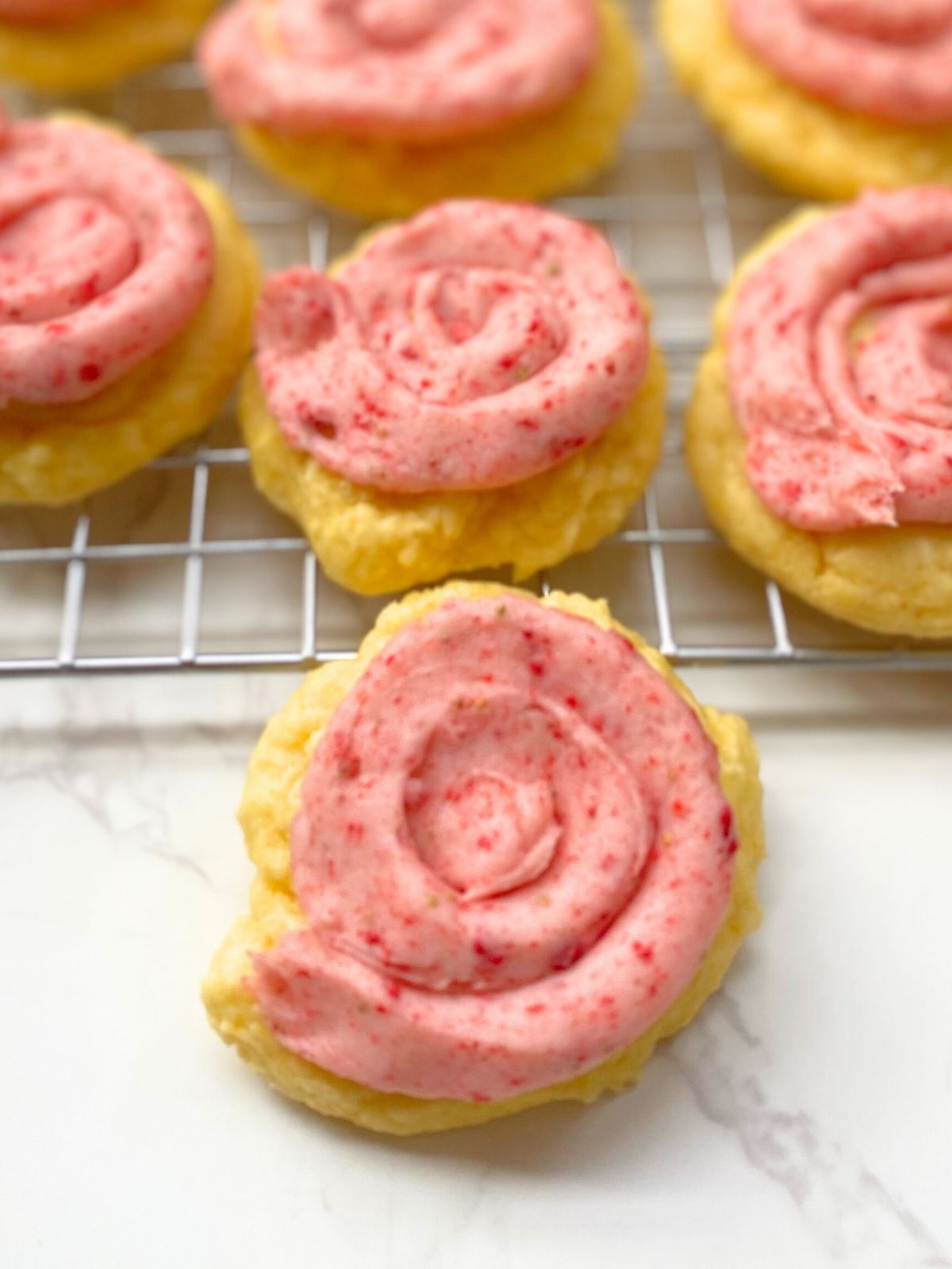 lemon cake mix cookies with strawberry frosting
