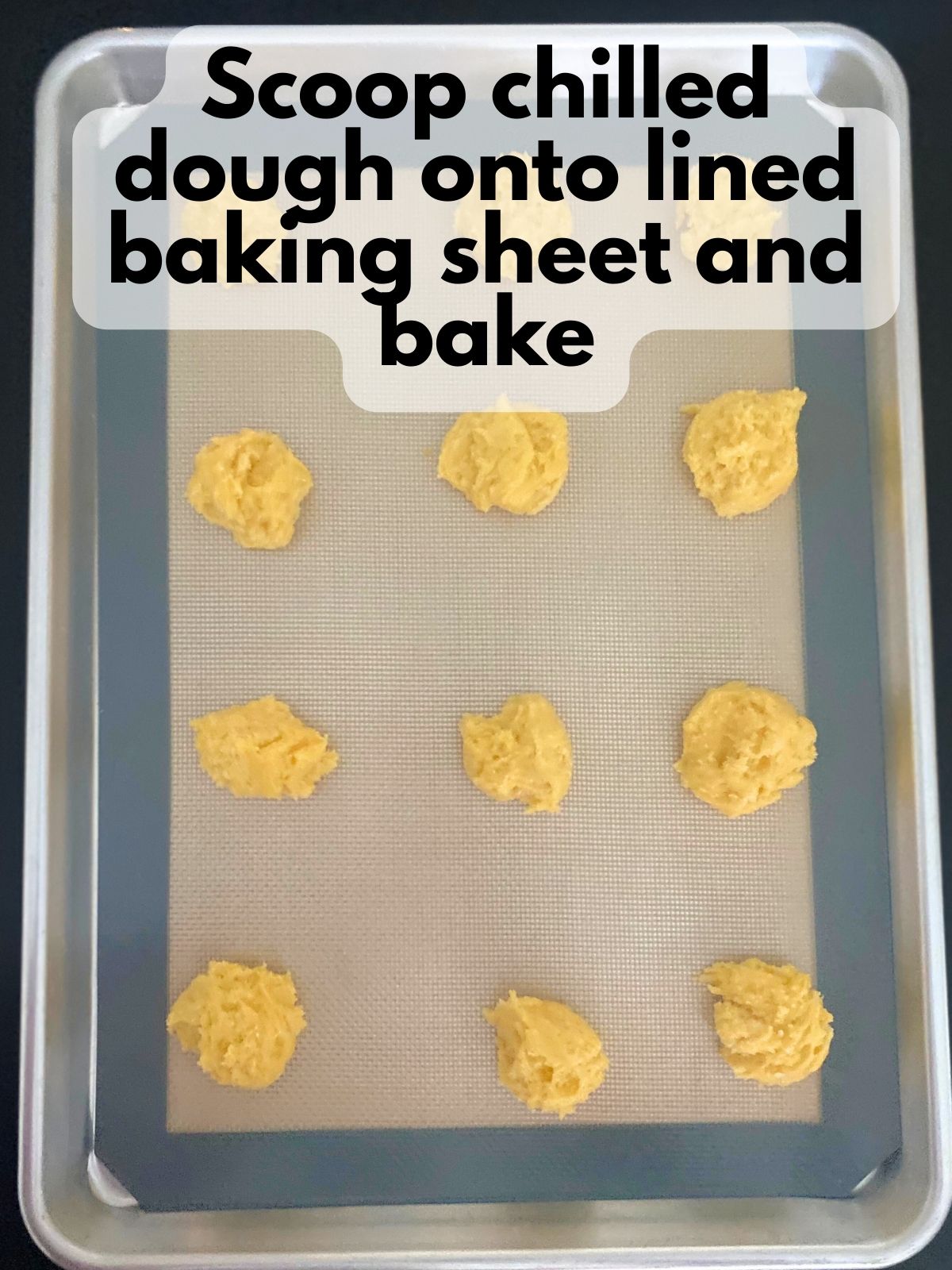 lemon cake mix cookie dough on a baking sheet