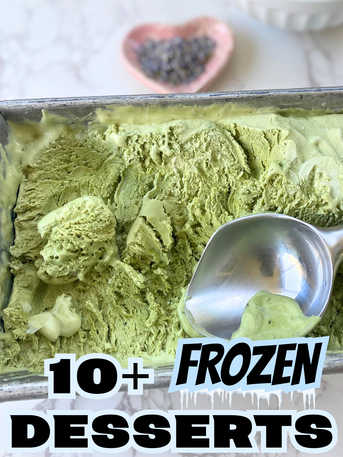 lavender matcha ice cream in a loaf pan with an ice cream scooper on top