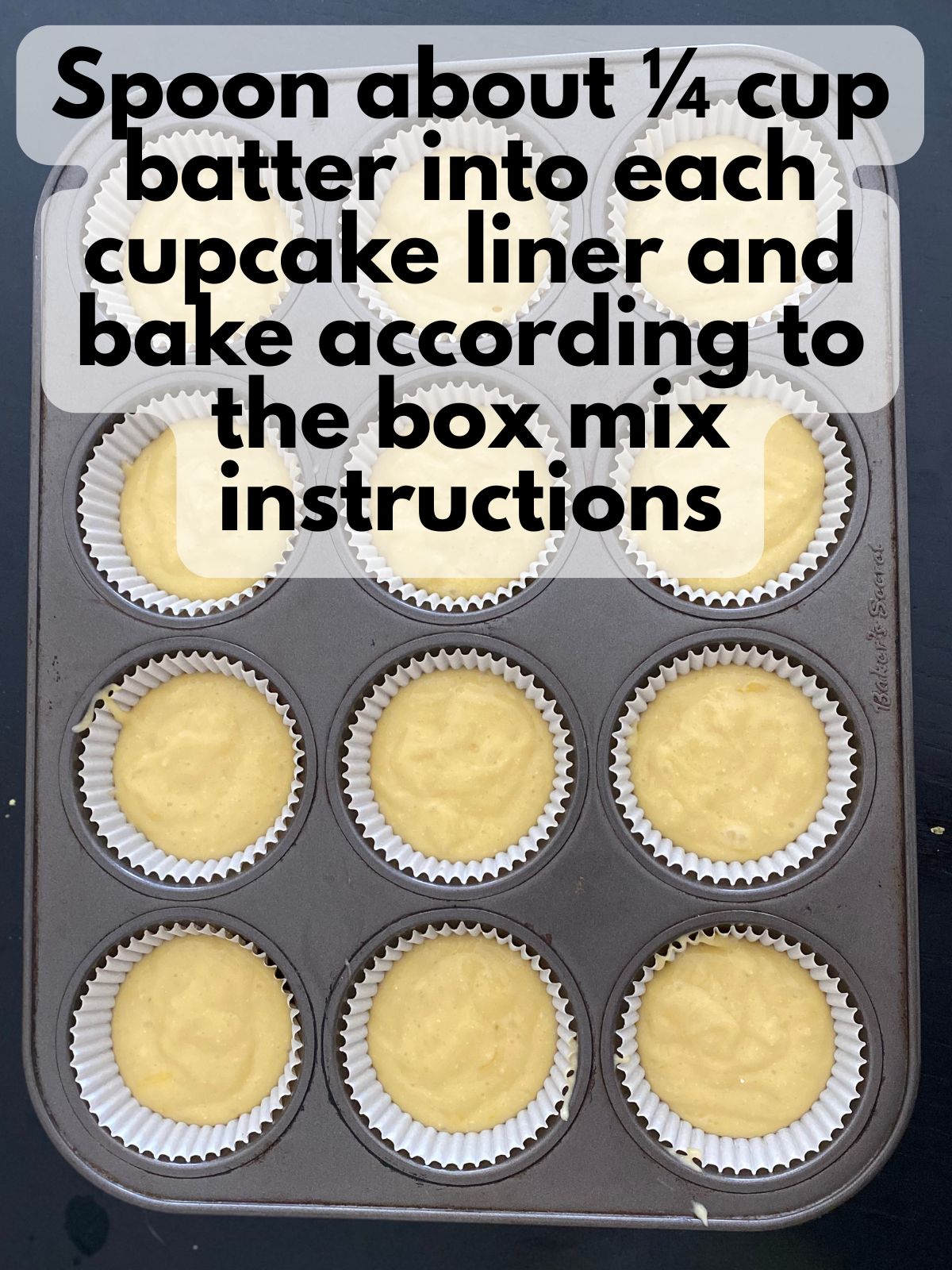 lemon cupcake batter in a muffin tin