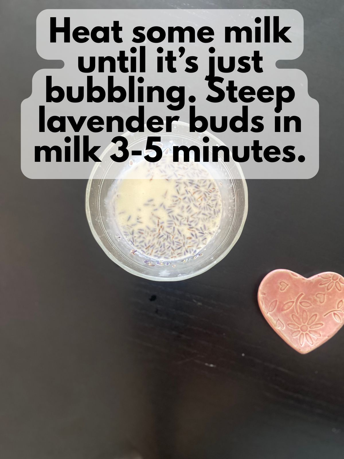 lavender buds steeping in hot milk