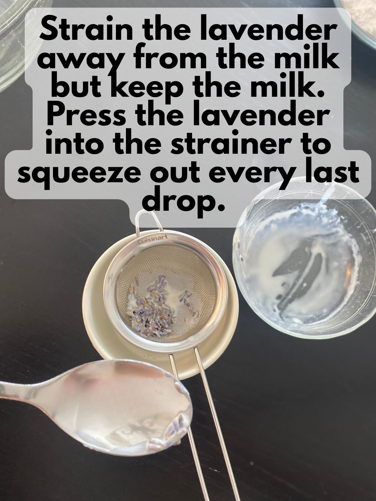 lavender buds being steeped in hot milk