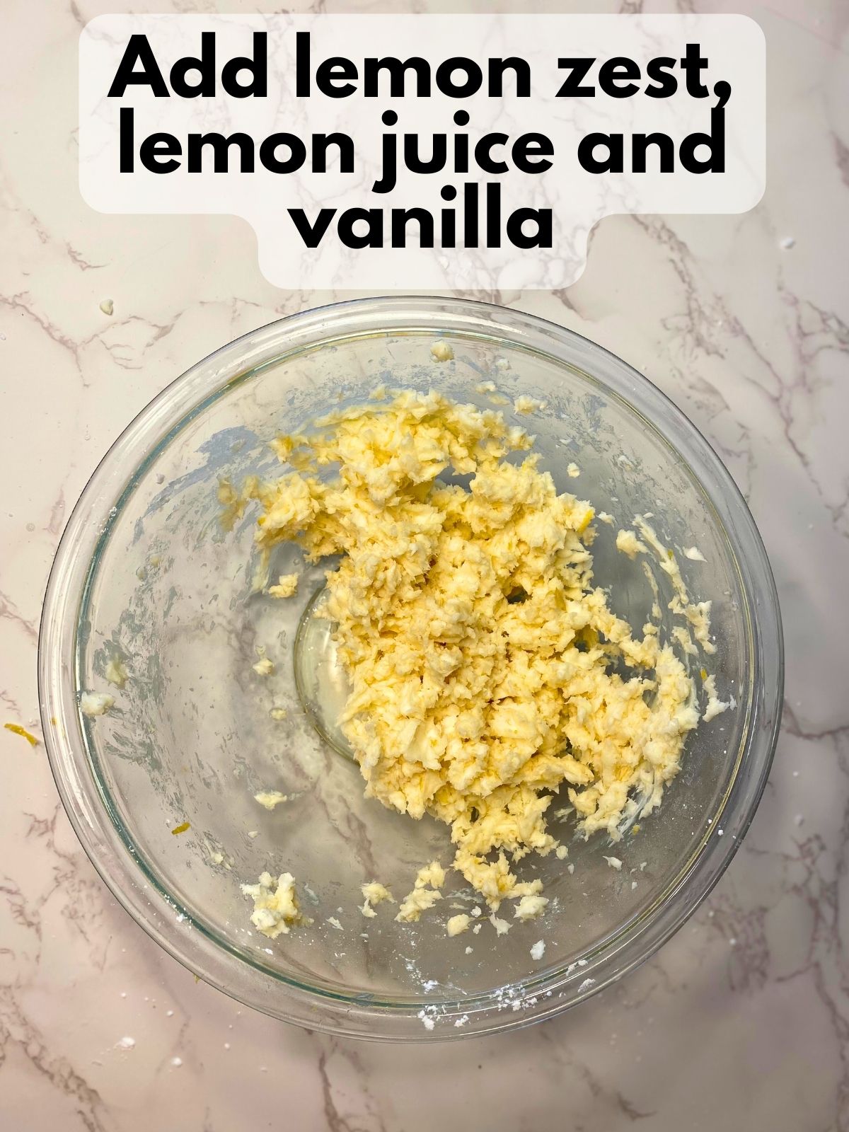 lemon zest, lemon juice and vanilla mixed with creamed powdered sugar and butter