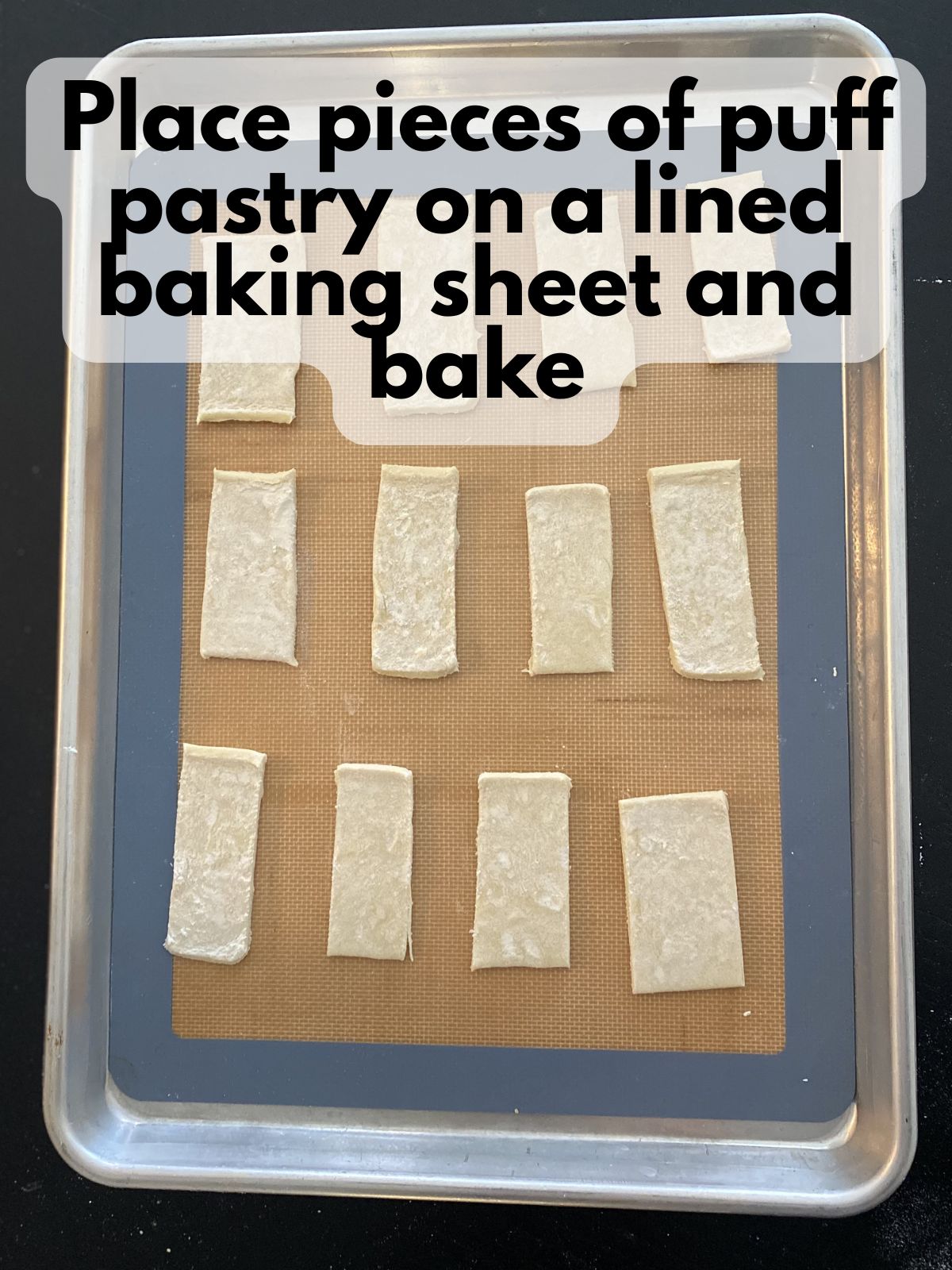 puff pastry cut into rectangle on a baking sheet