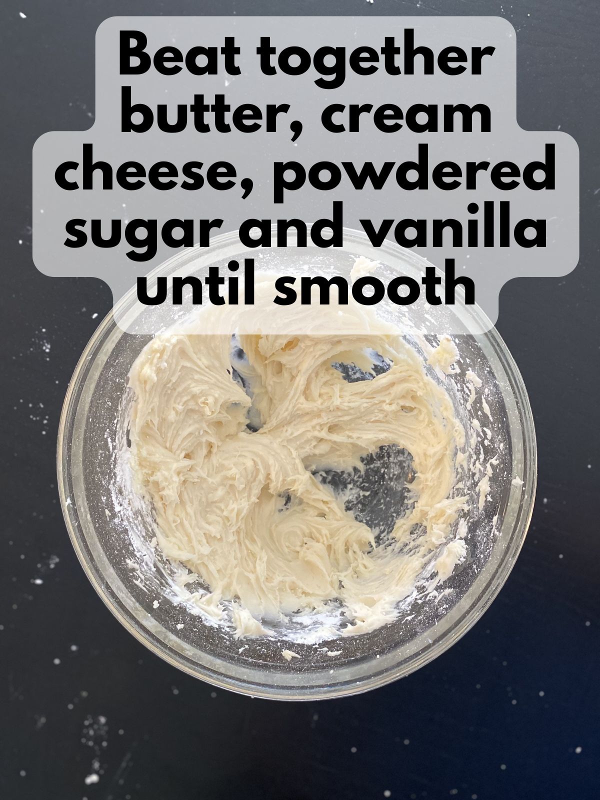 cream cheese frosting in a mixing bowl