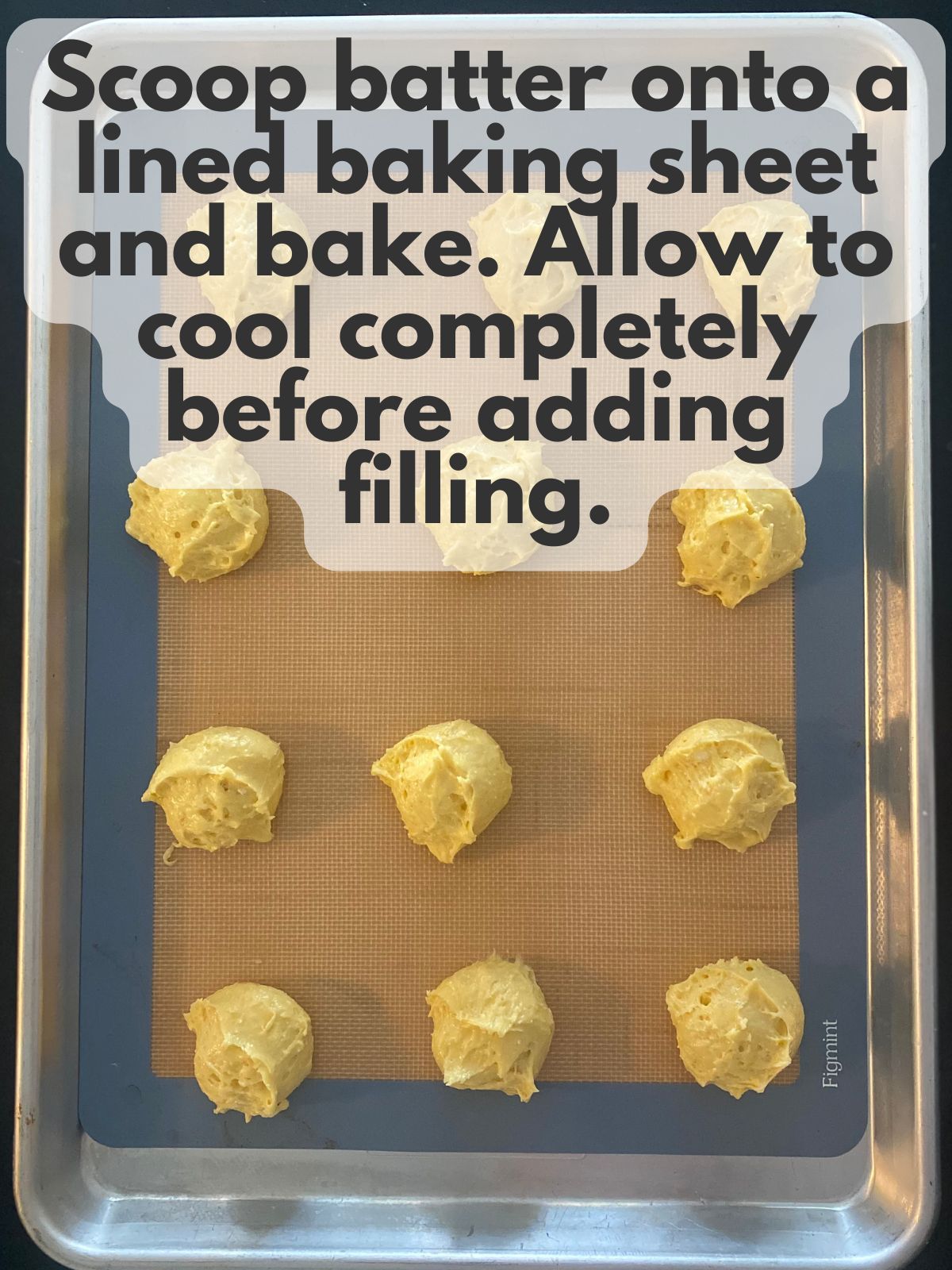 lemon whoopie pie batter scooped on a baking sheet