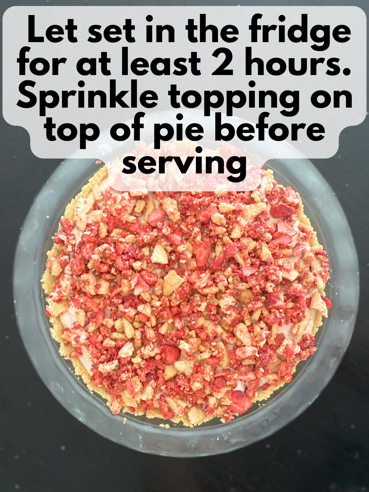 strawberry crunch pie with topping sprinkled on top