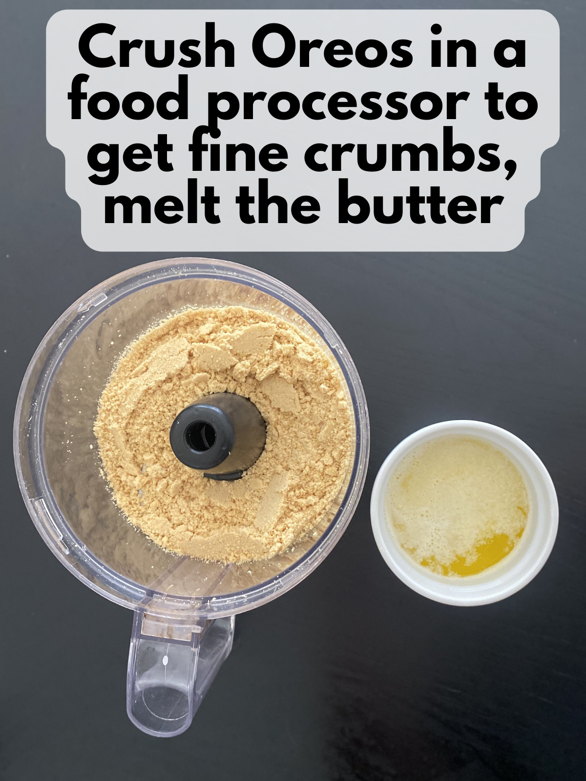 crushed Golden Oreos in a food processor and melted butter in a bowl