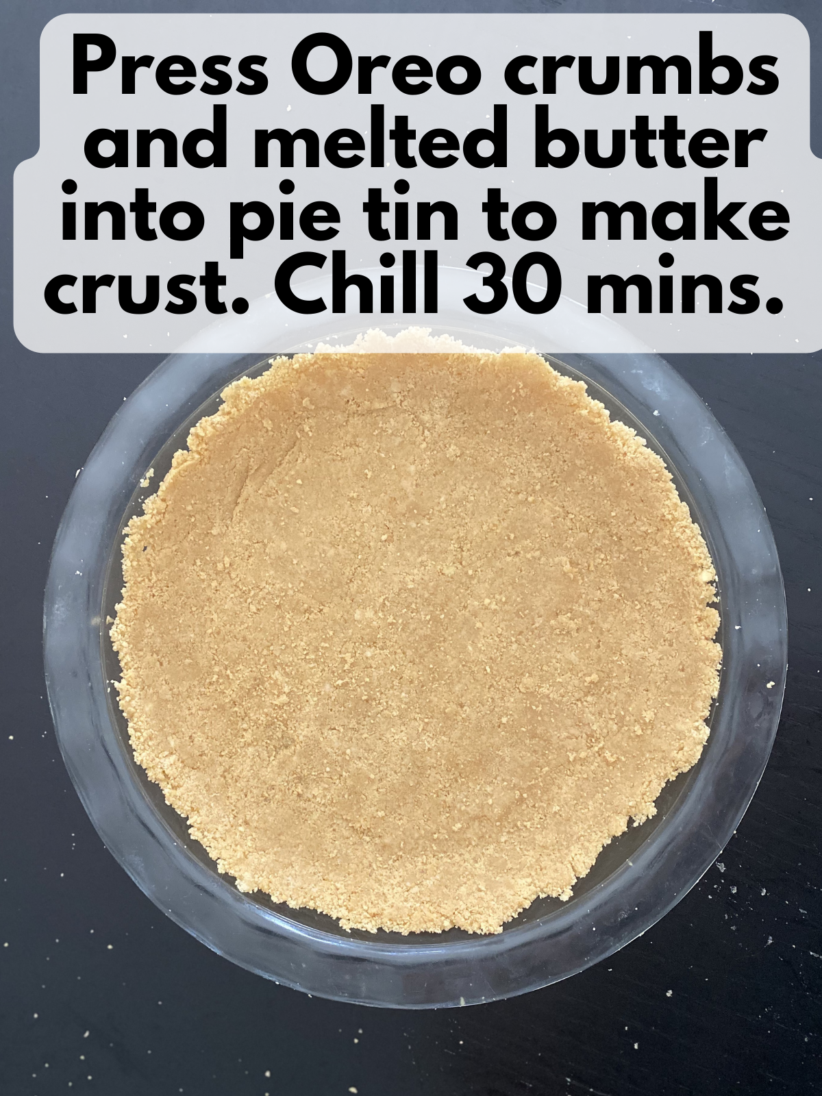 Golden Oreo crust pressed into a pie dish