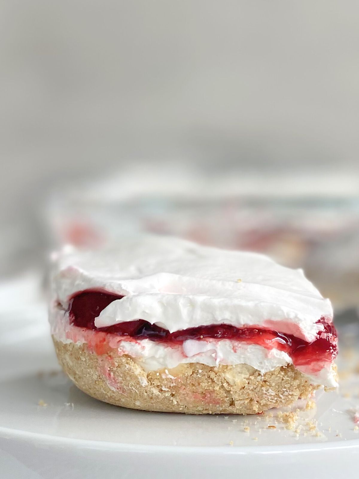 slice of strawberry lasagna on a plate