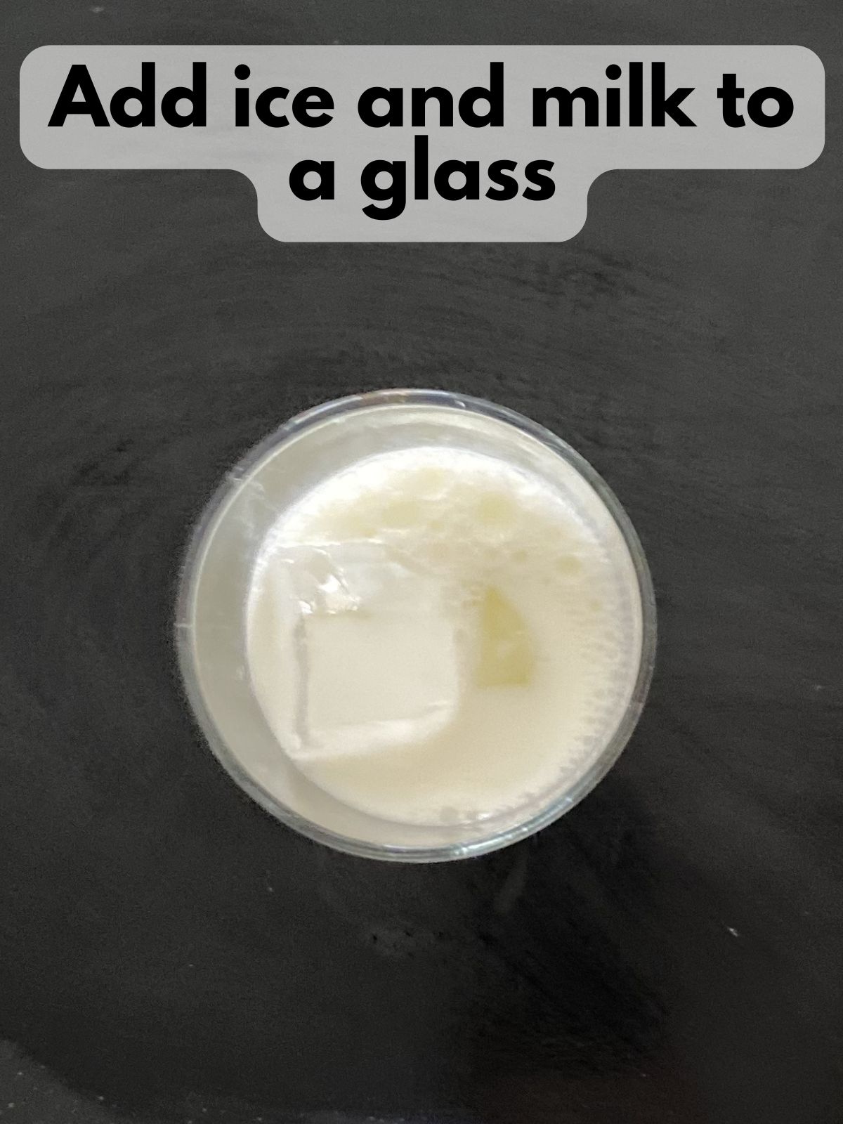 ice and milk in a glass